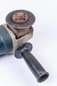 Old used rusty grinder round knife over white background Foto stock