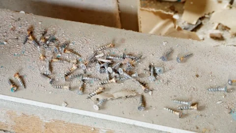 Old used screws are self-tapping screws. Old screws in close-up. Stock Footage 280169882