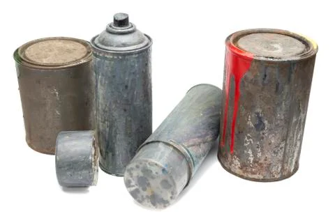 Old used spray cans and paint bucket Stock Photos