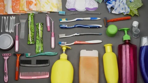 Old used toothbrushes, disposable razor, synthetic washcloth, single-use pads Stock Footage 125467190