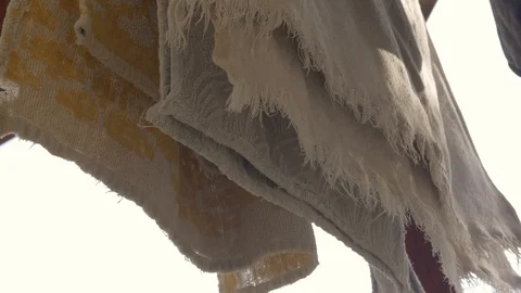 Old, used towels drying on the rack Stock Footage 115688996