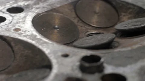 An old valve head contaminated with soot and rust. Stock Footage 208840137
