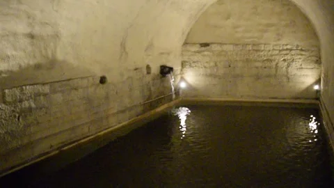 Old  vaulted stone reservoir Stockbeeldmateriaal 334321580