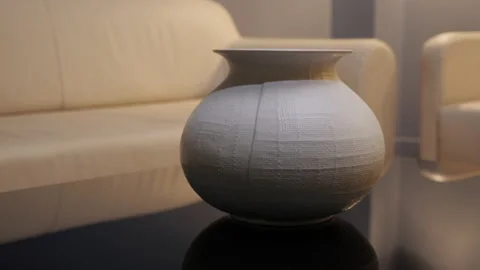 Old vessel on a glass table Stock Footage 154006521