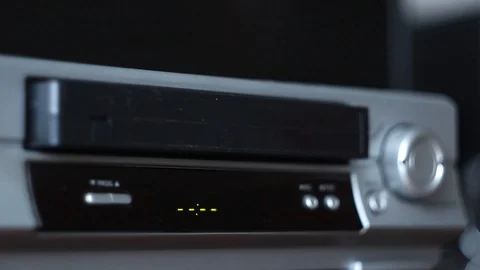 Old VHS Cassettes and Old Video Recorder. Video stock 125513835