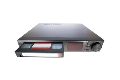 Old video cassette recorder ejecting tape isolated on white background Stock Photos