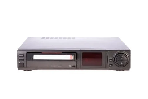 Old video cassette recorder ejecting tape isolated on white background Stock Photos