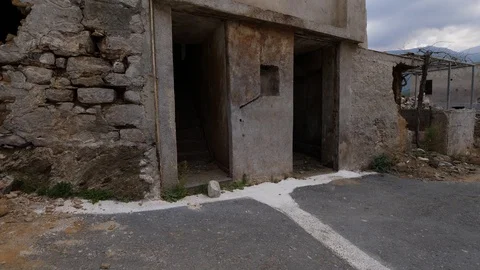 Old village building without doors and windows and ruined walls Stock Footage 103675799