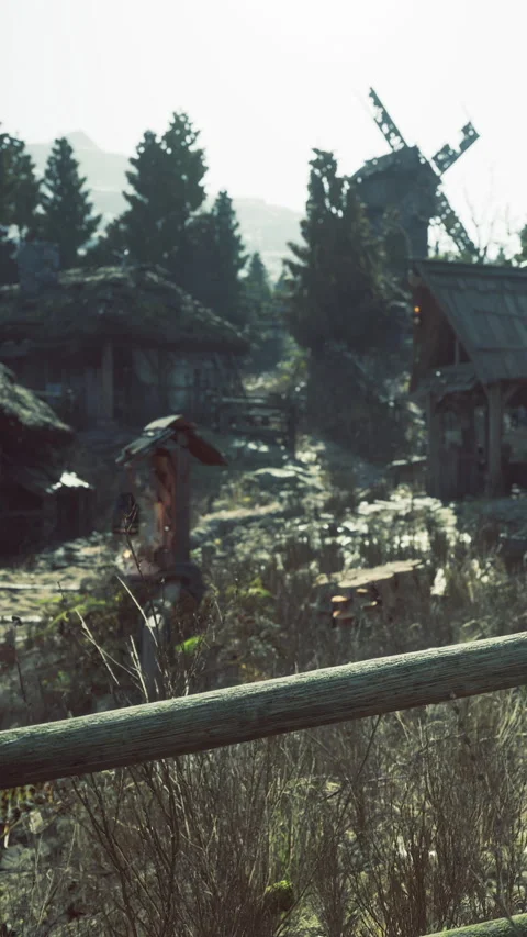 Old village path with rustic houses and windmill on a sunny day Stock Footage 341035462