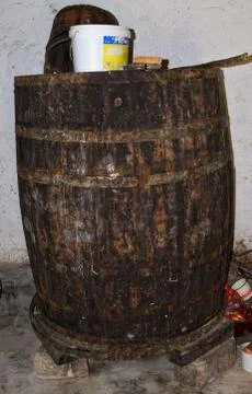Old vine barrel in cellar Stock Photos