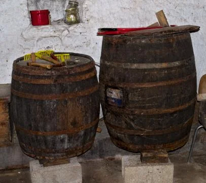Old vine barrels in cellar Stock Photos
