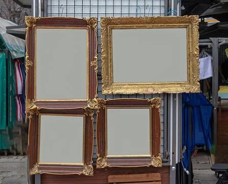 Old vintage blank frames outside on a street market Stock Photos