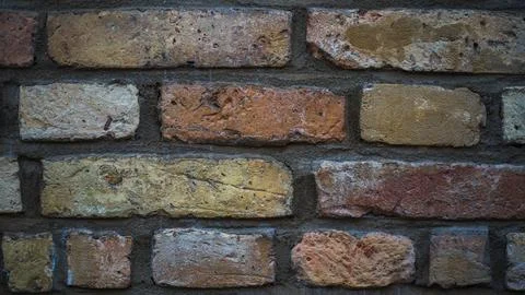 Old, vintage brickwork. Brick wall with different shades of brick Stock Photos