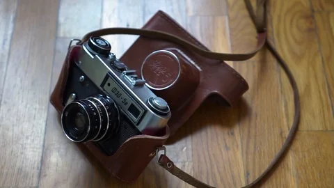 Old vintage camera on the wood Stock Footage 90021846