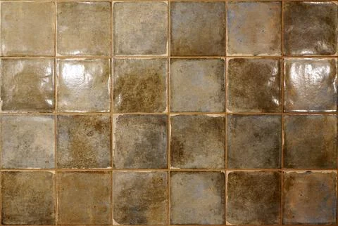 Old vintage ceramic tile background. Old vintage ceramic tiles in green to Stock Photos