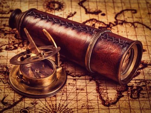 Old vintage compass on ancient map Stock Photos