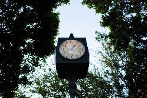 Old Vintage English Styled Outdoor Clock in Downtown Tempe, AZ. Stock Photos
