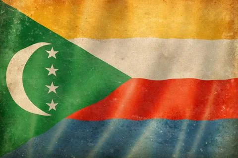 Old vintage flag of Comoros, worn and stained Stock Illustration