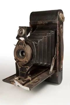Old Vintage Foldable Camera on White Background Stock Photos