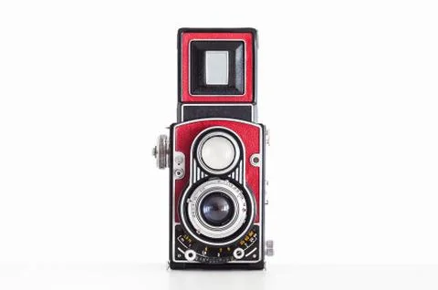 Old vintage medium square format twin lens reflex camera wrapped in red leath Fotos de archivo