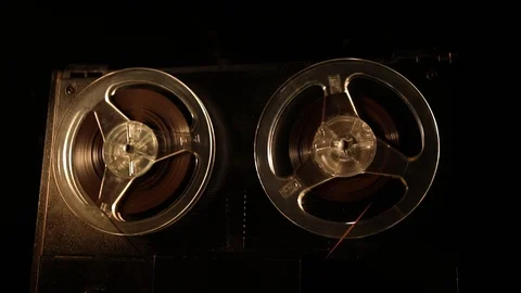 Old vintage reel to reel player and recorder on dark toned foggy