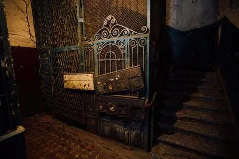 Old vintage rusty elevator gates in old mansion Stock Photos
