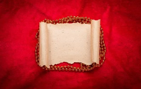 Old vintage scroll on red background Stock Photos