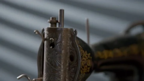 Old vintage sewing machine, handle turning and rotating mechanism. Hand rotates Stock Footage 167670277