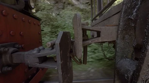 Old vintage train connection between cart and locomotive while moving Stock Footage 92359974