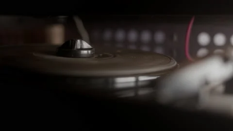 Old vintage turntable is spinning without vinyl record. Retro player of broken Stock Footage 236724695