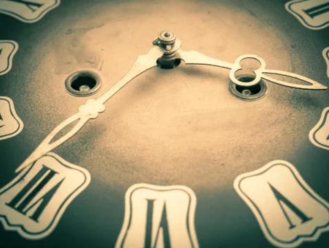 Old vintage wall clock with pendulum Foto stock