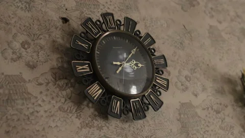 Old vintage wall clock with Roman numerals, country house, Belarus Stock Footage 99488604