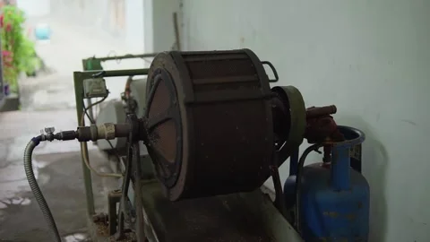 Old-vintage working roasting coffee machine. Traditional cafe and coffee Stock Footage 224038739
