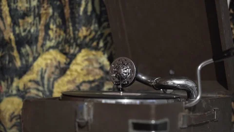 An old vinyl record player. The old gramophone is playing a record. Atmosphere Stock Footage 115850298