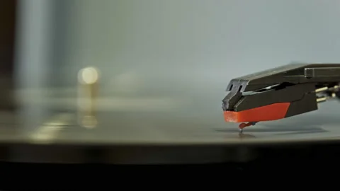 Old vinyl record player turning Stock Footage 220490063