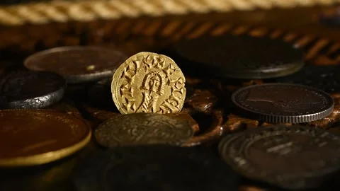Old Visigothic gold coin in an old rotating wooden chest Stock Footage 333912384