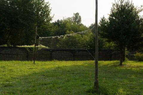 An old volleyball net on a country plot Stock Photos