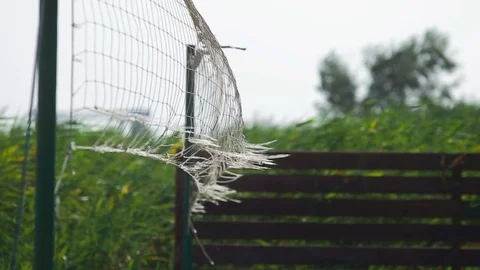 Old volleyball net in the wind Stock Footage 74833776