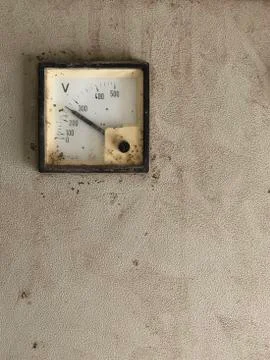 Old Voltage meter gauge vertical photo. Stock Photos