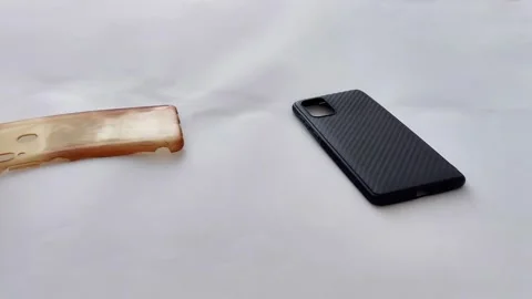Old vs New Smartphone Case: Wear and Texture Side-by-Side Comparison 스톡 동영상 328138847