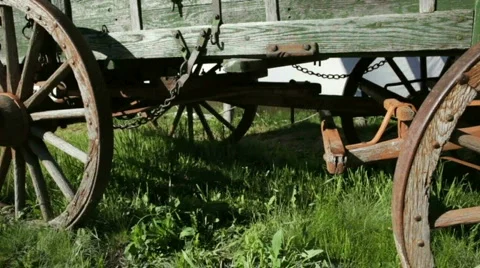 Old Wagon Wheels on Covered Wagon - BigWeb Stock-Footage 878836