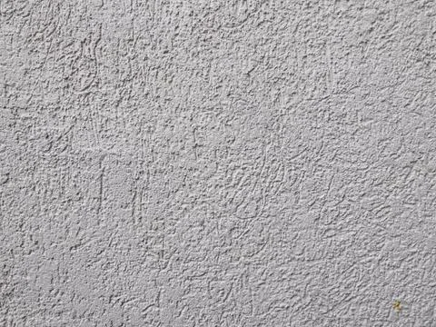 Old wall background close up. concrete wall texture . Textured stone sandstone Stock Photos