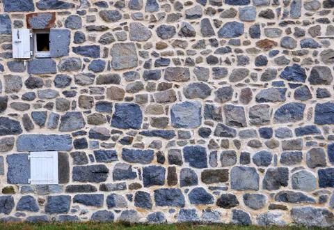 Old wall background. Old irregular stone pattern Stock Photos