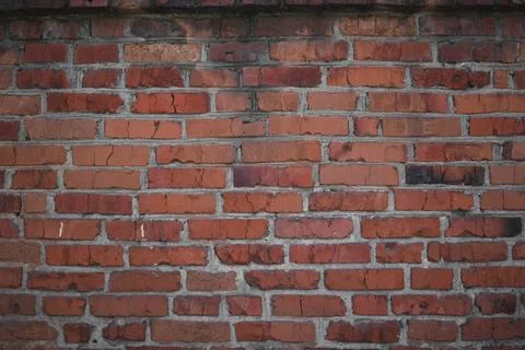 Old wall background with stained aged bricks Stock Photos