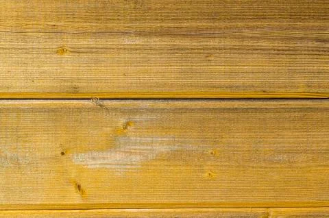 Old wall of boards covered with paint. Background Stock Photos