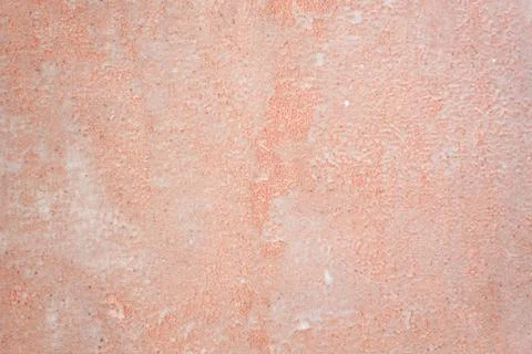 Old wall bright orange texture. Rough textured wall with copy space. Stock Photos