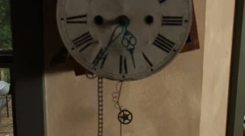 Old wall clock with exposed gears. Tilt up and rack-focus in. HD 1080p 24fps. Stock Footage 22725538