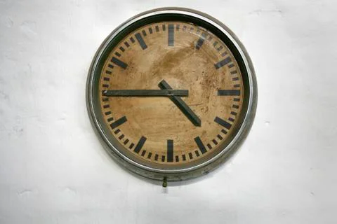 Old wall clock on white Foto stock