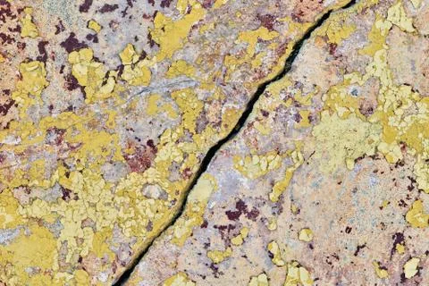 Old wall with falling off paint and plaster. On diagonally much fissure. Stock Photos