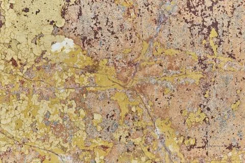 Old wall with falling off paint and plaster. A few cracks. Stock Photos